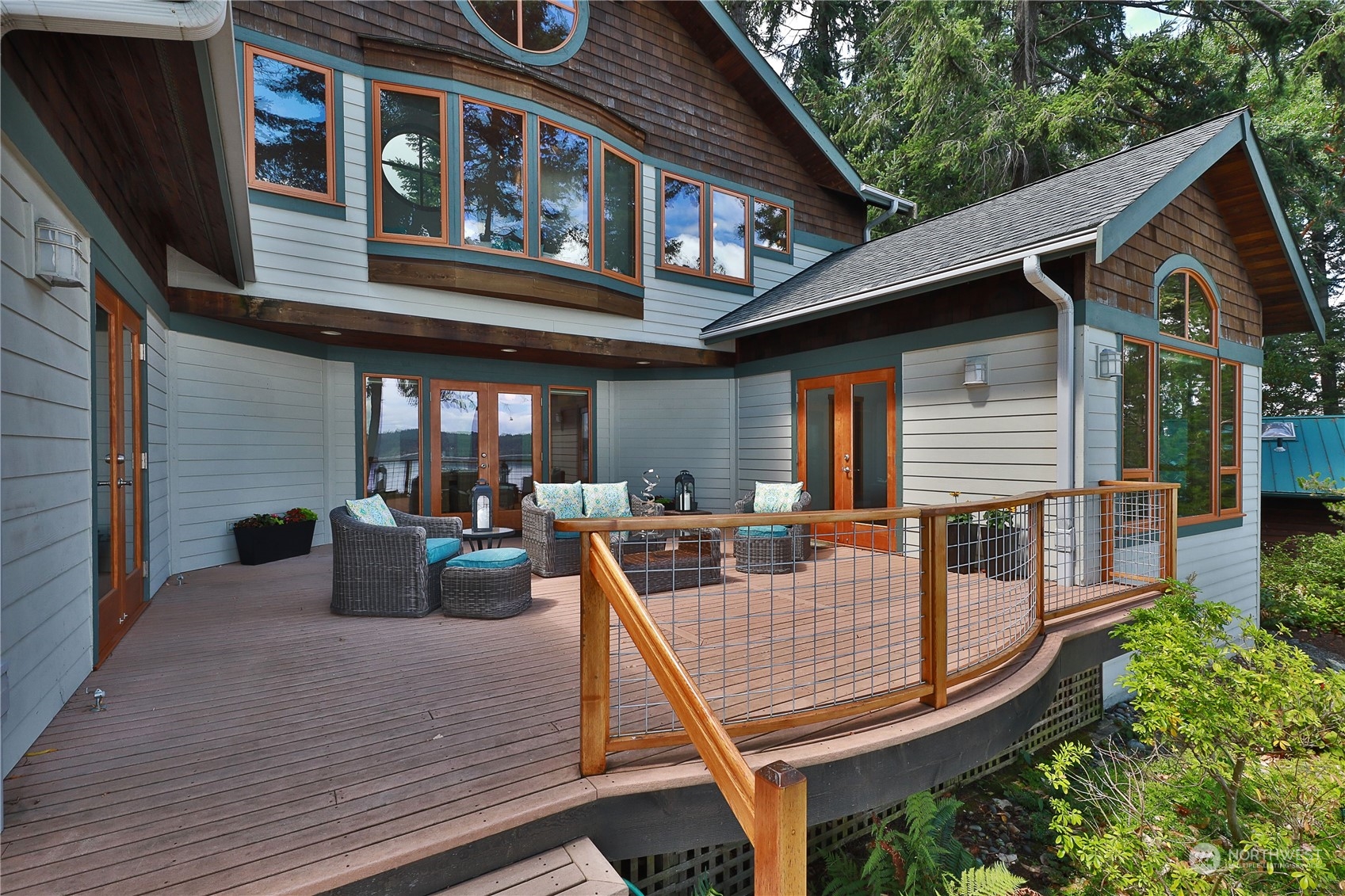1292 Dines Point Road Greenbank, WA 98253 - Photo 34 of 40 a view of a house with backyard and sitting area