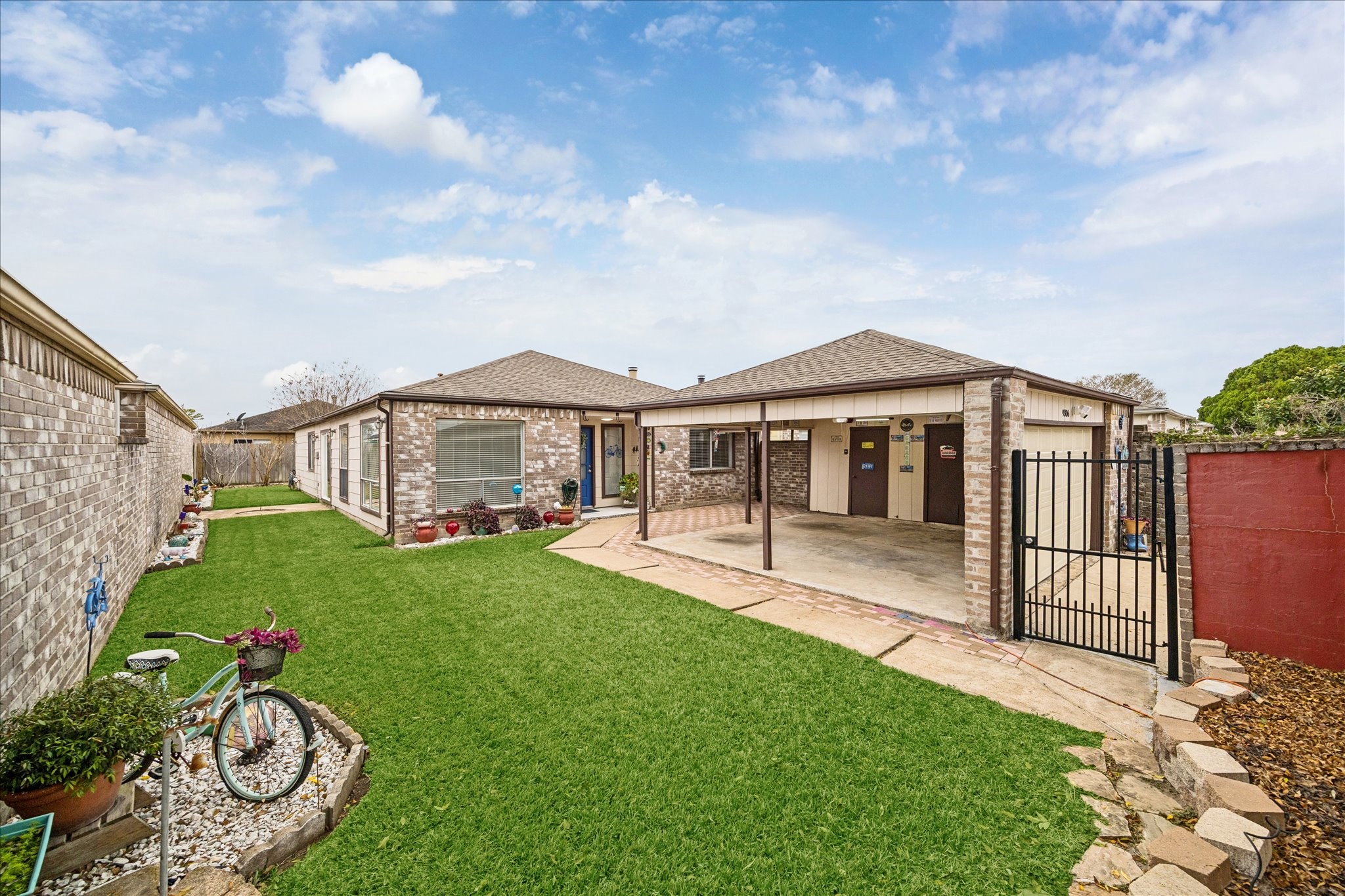 a front view of a house with garden