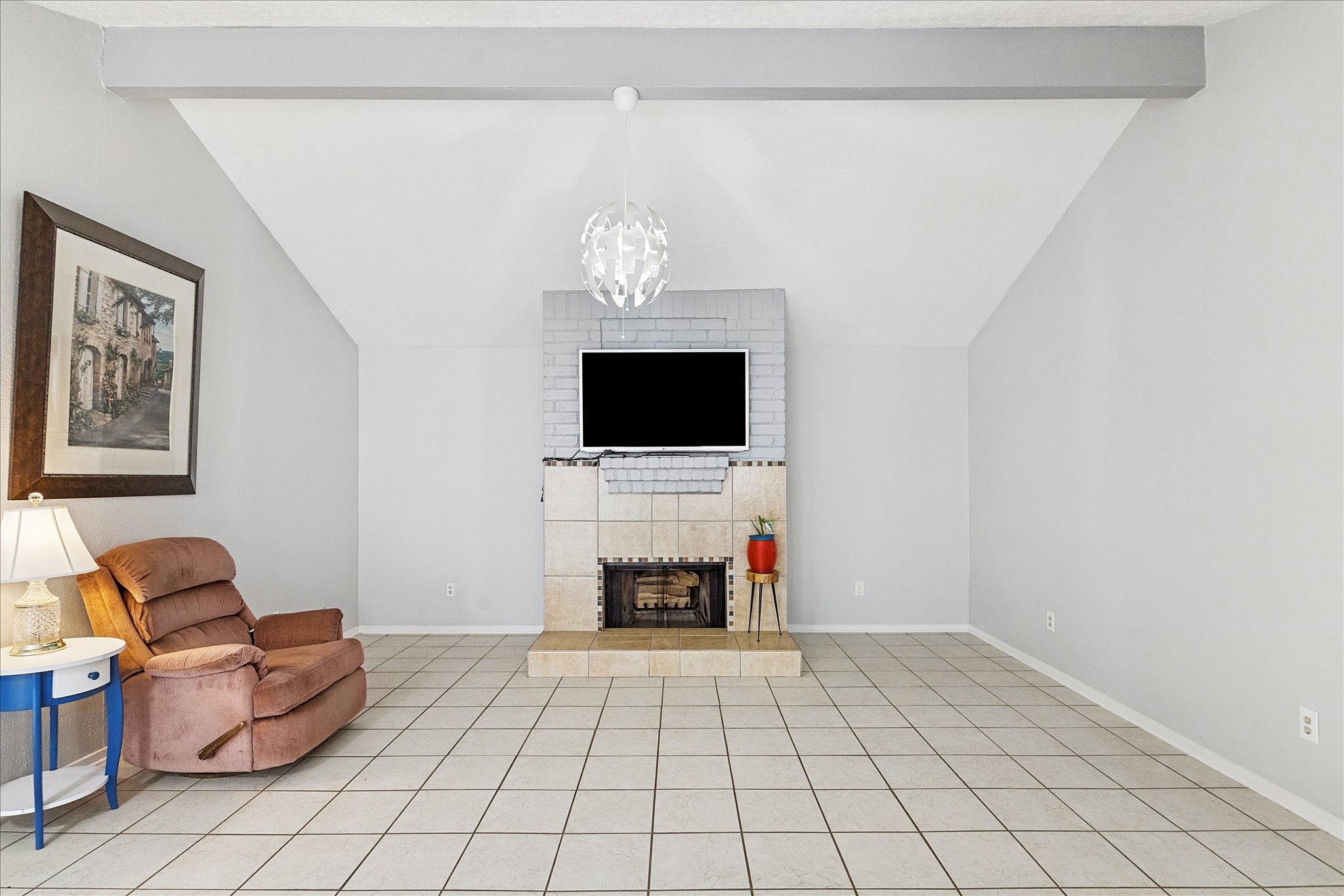9306 Riverside Lodge Drive Houston, TX 77083 - Photo 12 of 20 a living room with furniture and a flat screen tv