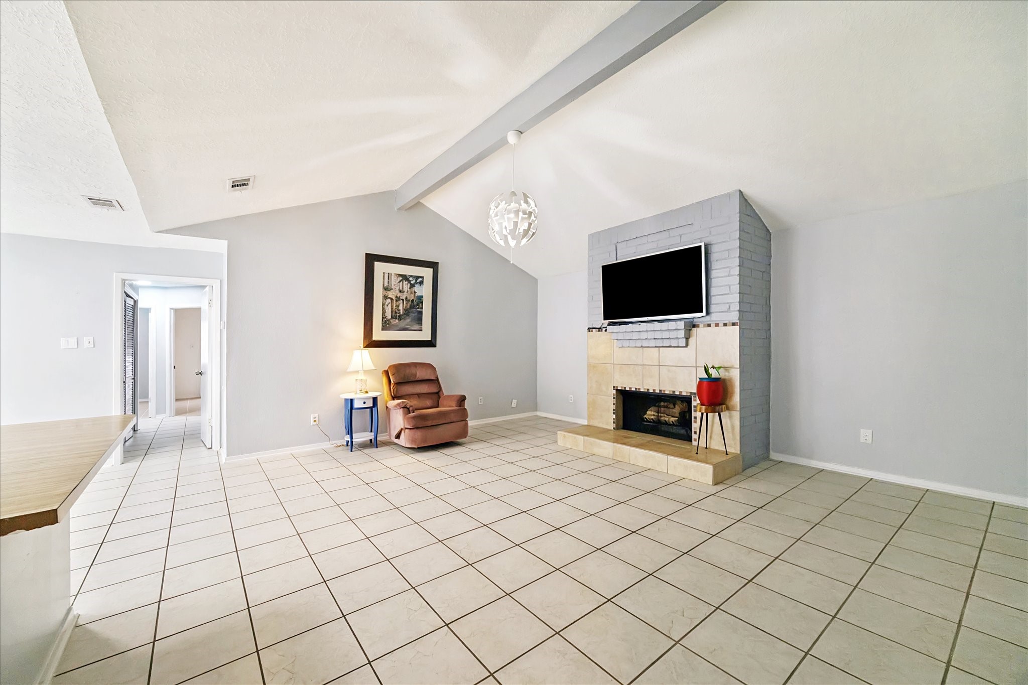 9306 Riverside Lodge Drive Houston, TX 77083 - Photo 4 of 20 a view of living room with furniture and fireplace