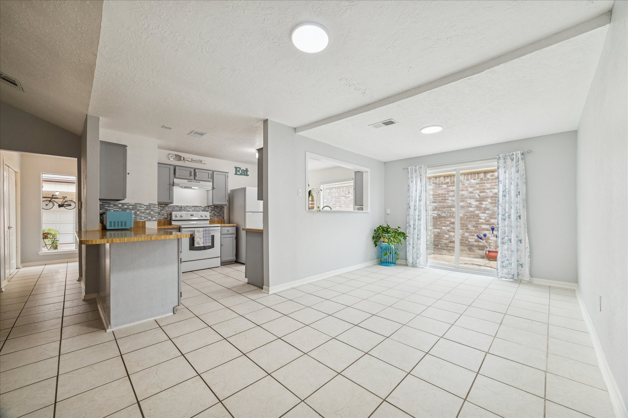 9306 Riverside Lodge Drive Houston, TX 77083 - Photo 10 of 20 a view of kitchen with furniture and refrigerator