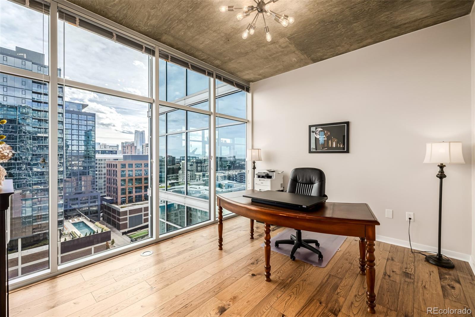 1700 Bassett Street, Unit 1412 Denver, CO 80202 - Photo 12 of 43 a room with furniture and a window