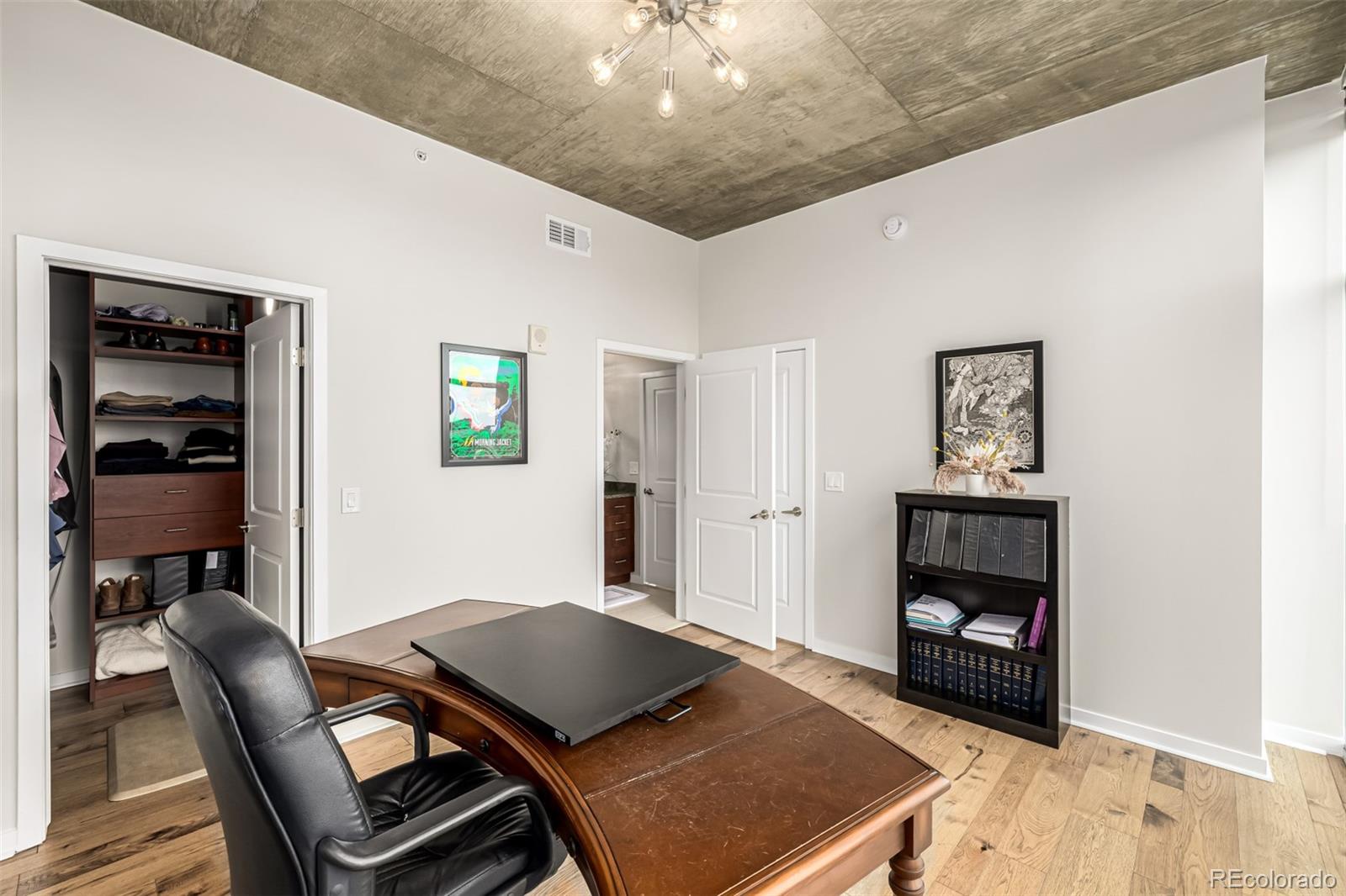 1700 Bassett Street, Unit 1412 Denver, CO 80202 - Photo 13 of 43 a room with furniture and a window