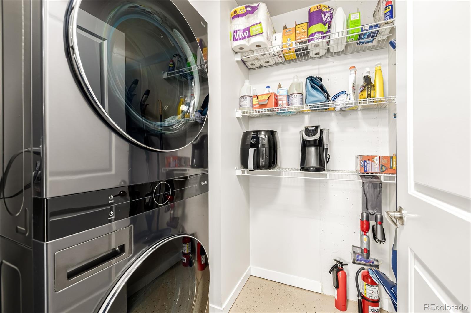 1700 Bassett Street, Unit 1412 Denver, CO 80202 - Photo 17 of 43 a utility room with dryer and washer