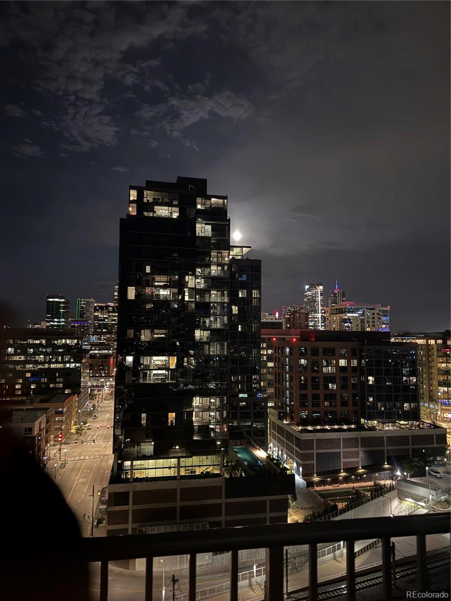 1700 Bassett Street, Unit 1412 Denver, CO 80202 - Photo 24 of 43 a table with wine bottles and glasses on it