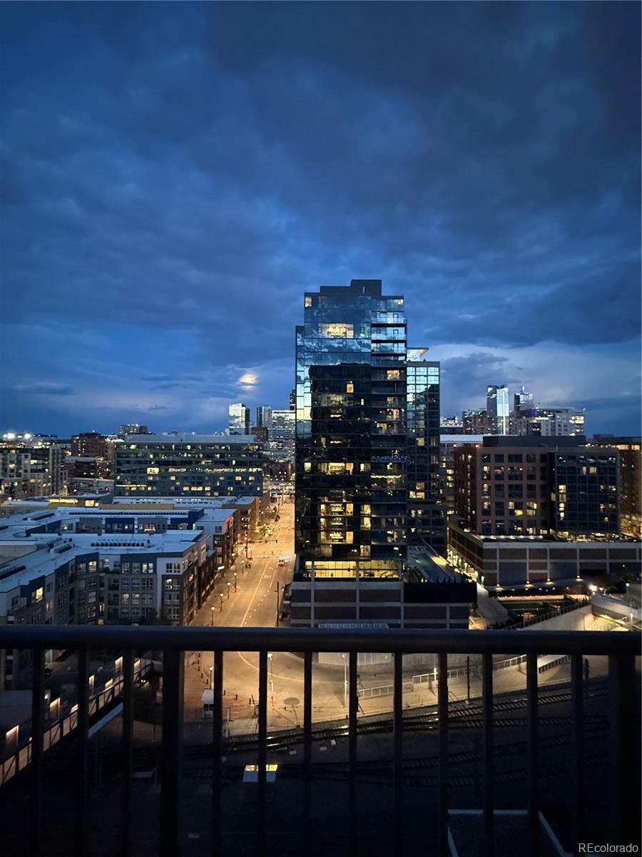 1700 Bassett Street, Unit 1412 Denver, CO 80202 - Photo 25 of 43 a view of a chairs and table in a terrace