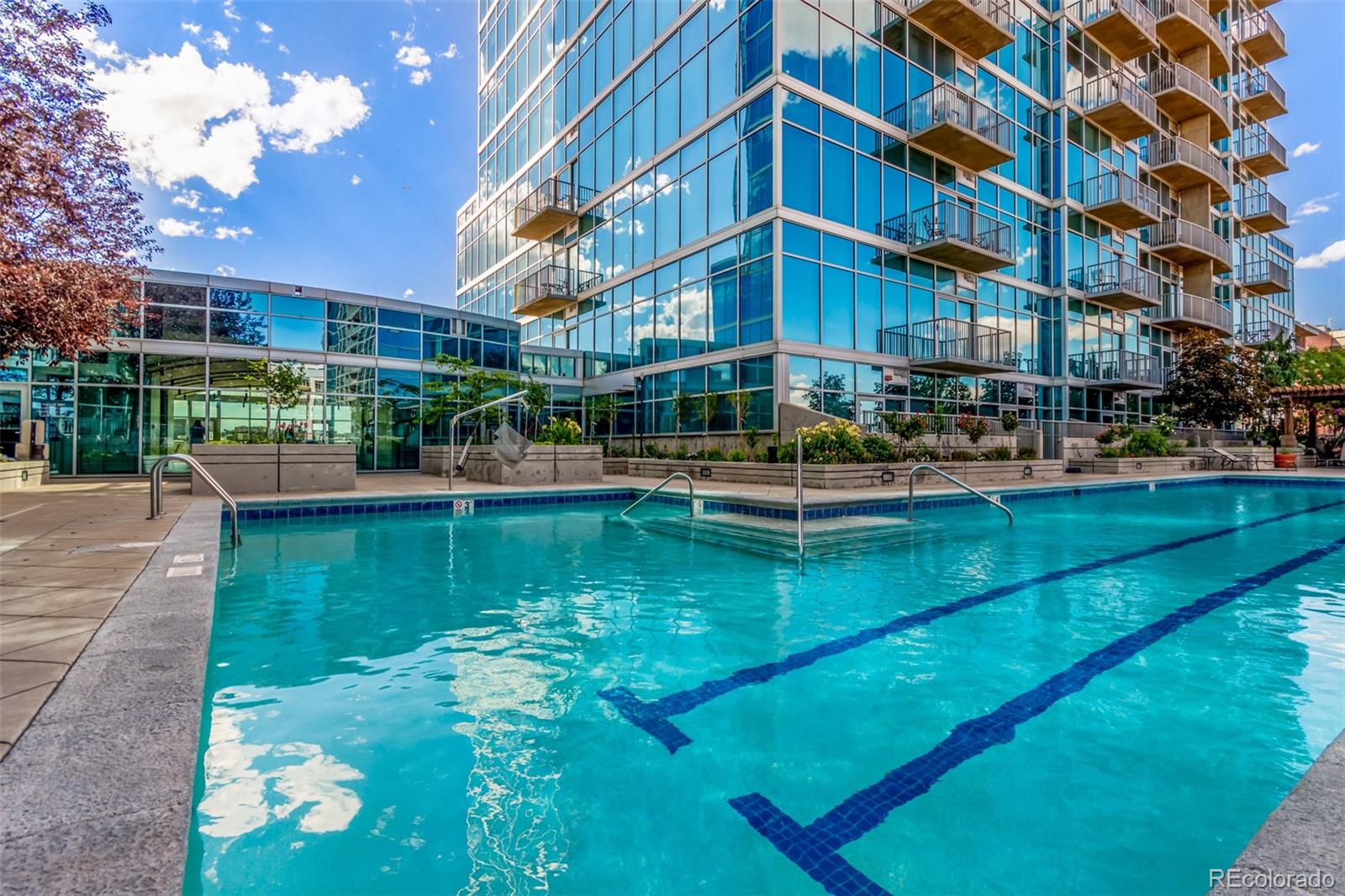 1700 Bassett Street, Unit 1412 Denver, CO 80202 - Photo 26 of 43 a view of a lake with a building