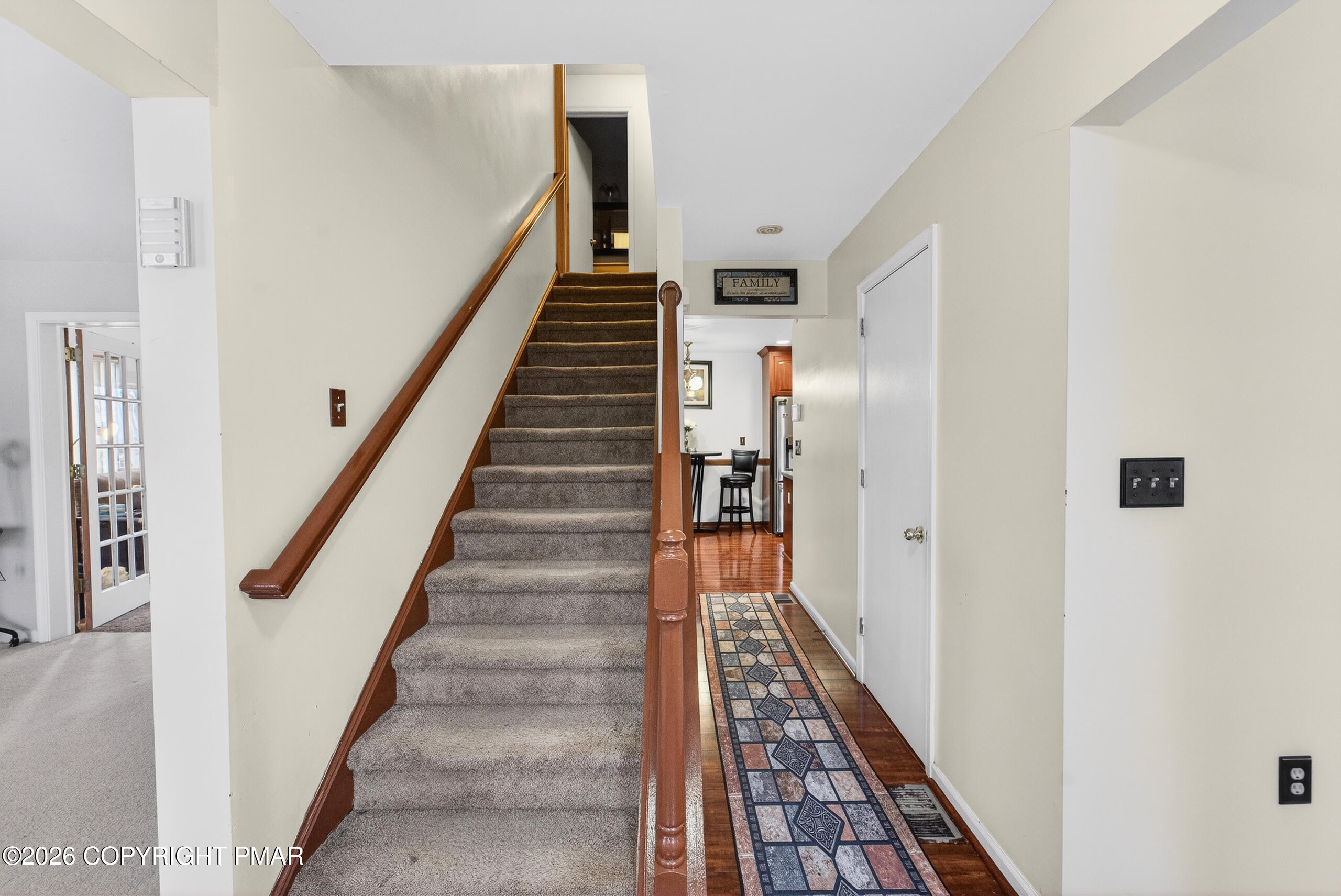6293 Decker Road Bushkill, PA 18324 - Photo 11 of 38 a view of a hallway with wooden floor and entryway