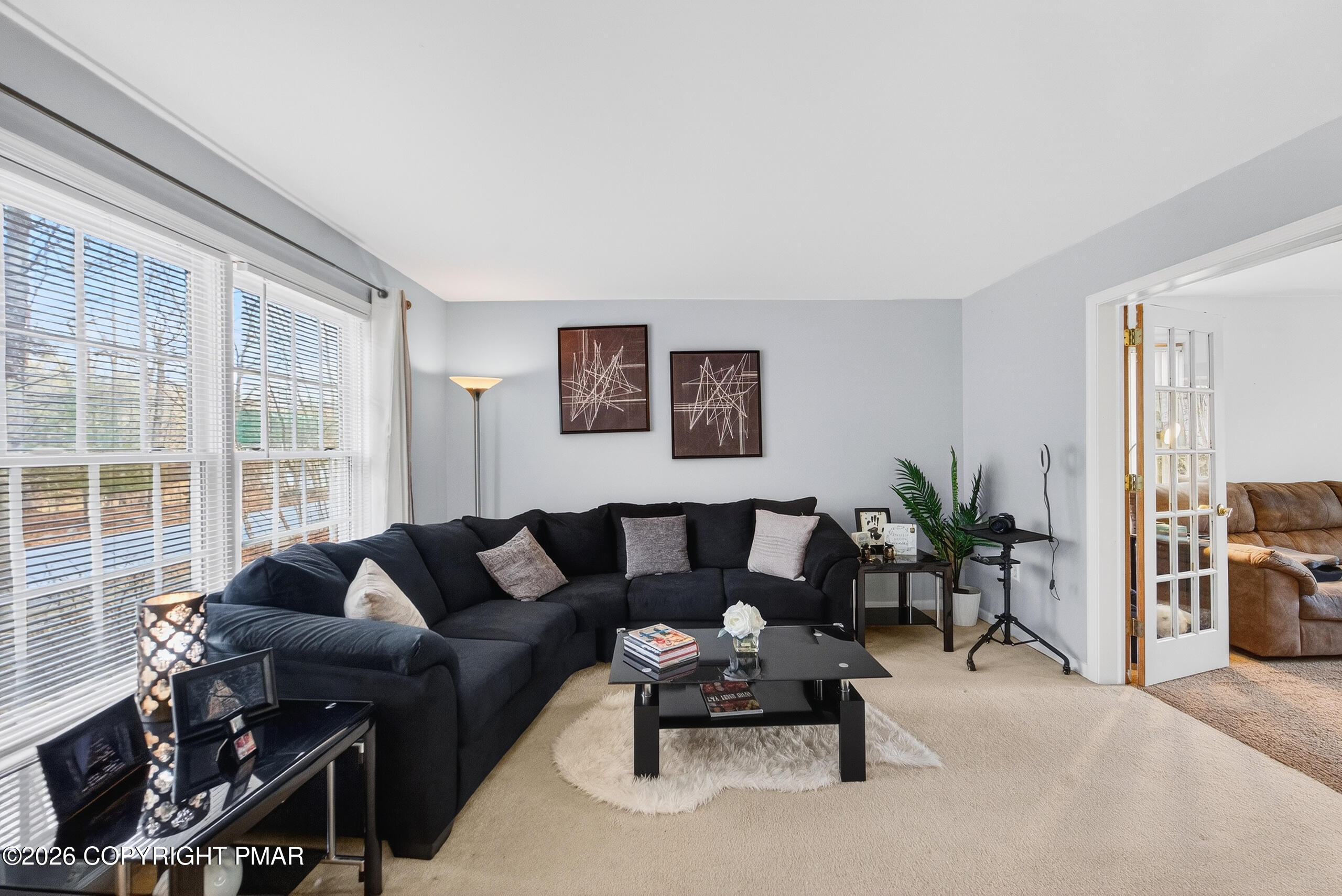 6293 Decker Road Bushkill, PA 18324 - Photo 12 of 38 a living room with furniture and large windows