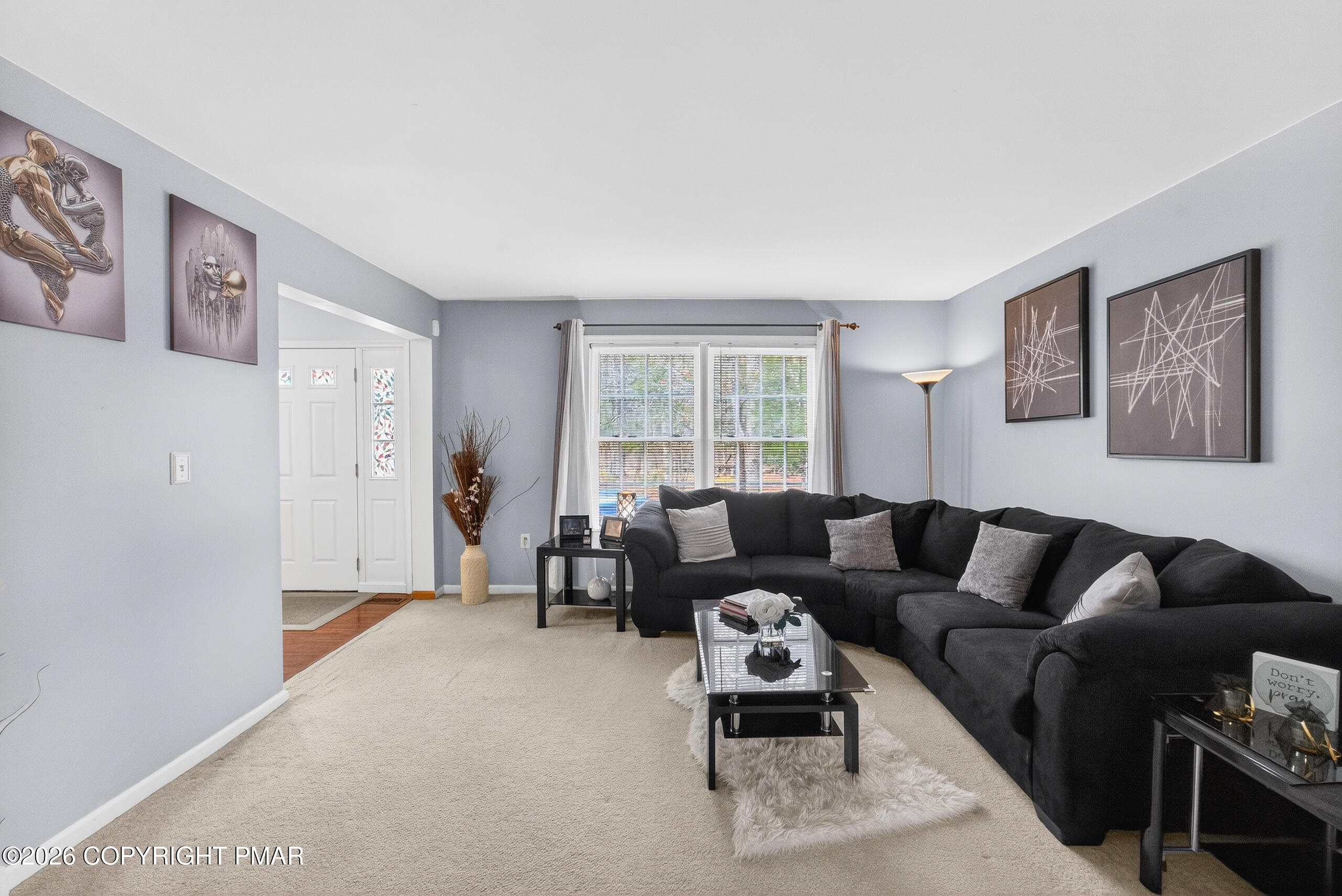 6293 Decker Road Bushkill, PA 18324 - Photo 13 of 38 a living room with furniture and a window