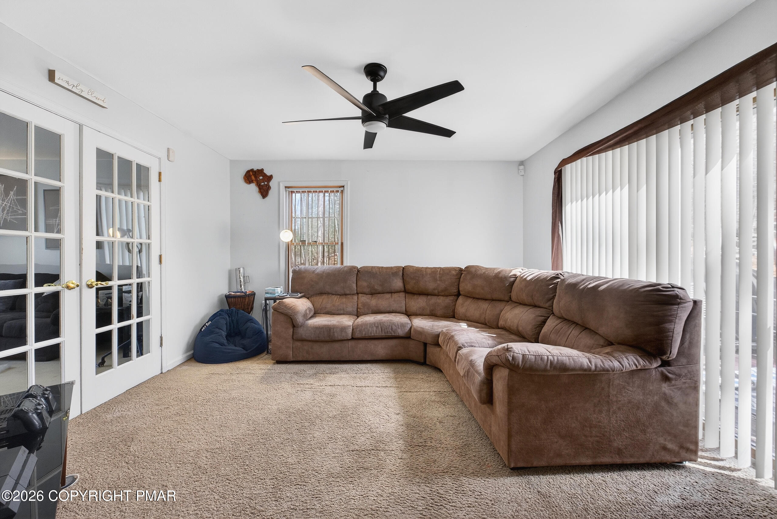 6293 Decker Road Bushkill, PA 18324 - Photo 15 of 38 a living room with furniture and a large window