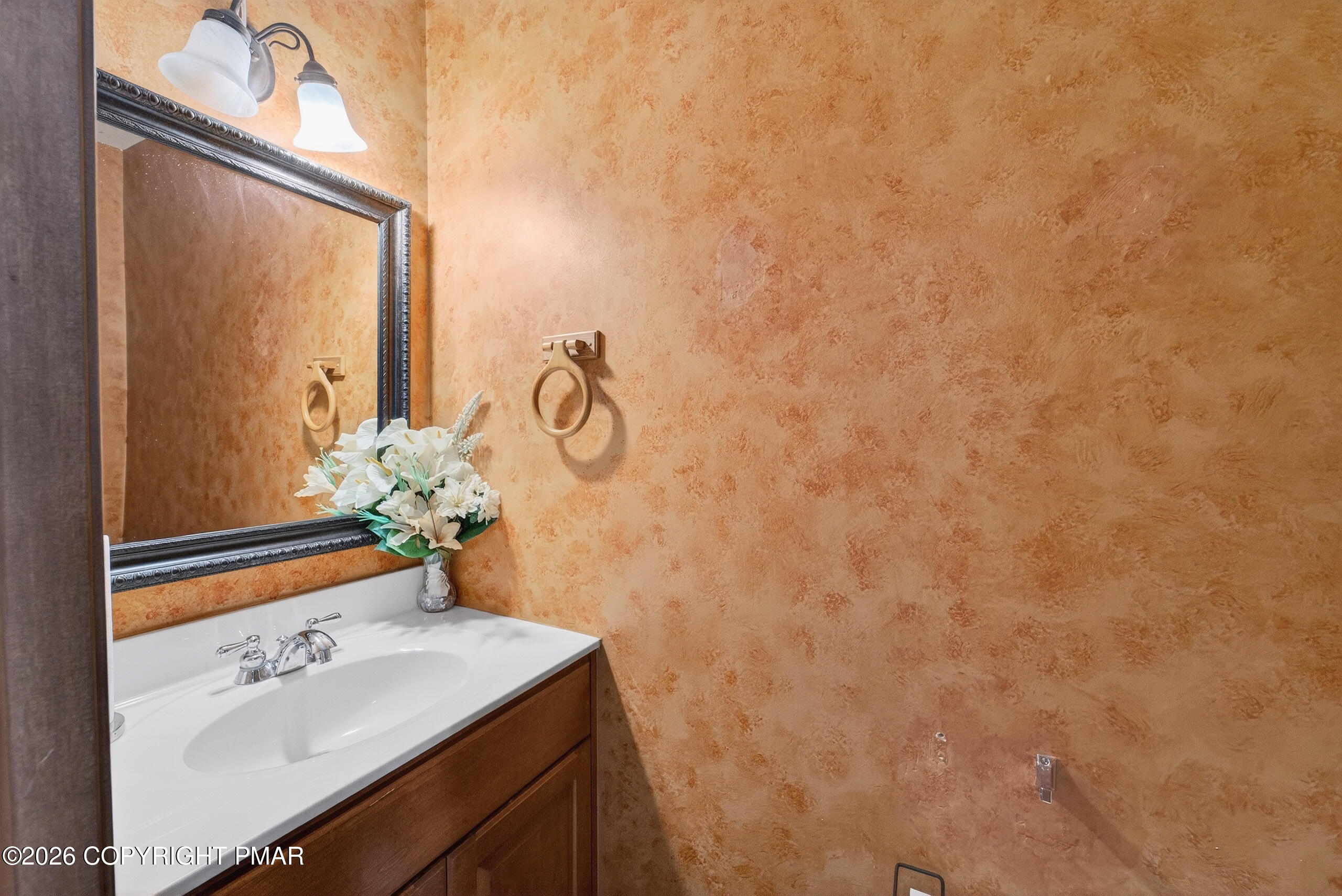 6293 Decker Road Bushkill, PA 18324 - Photo 22 of 38 a bathroom with a sink and a mirror