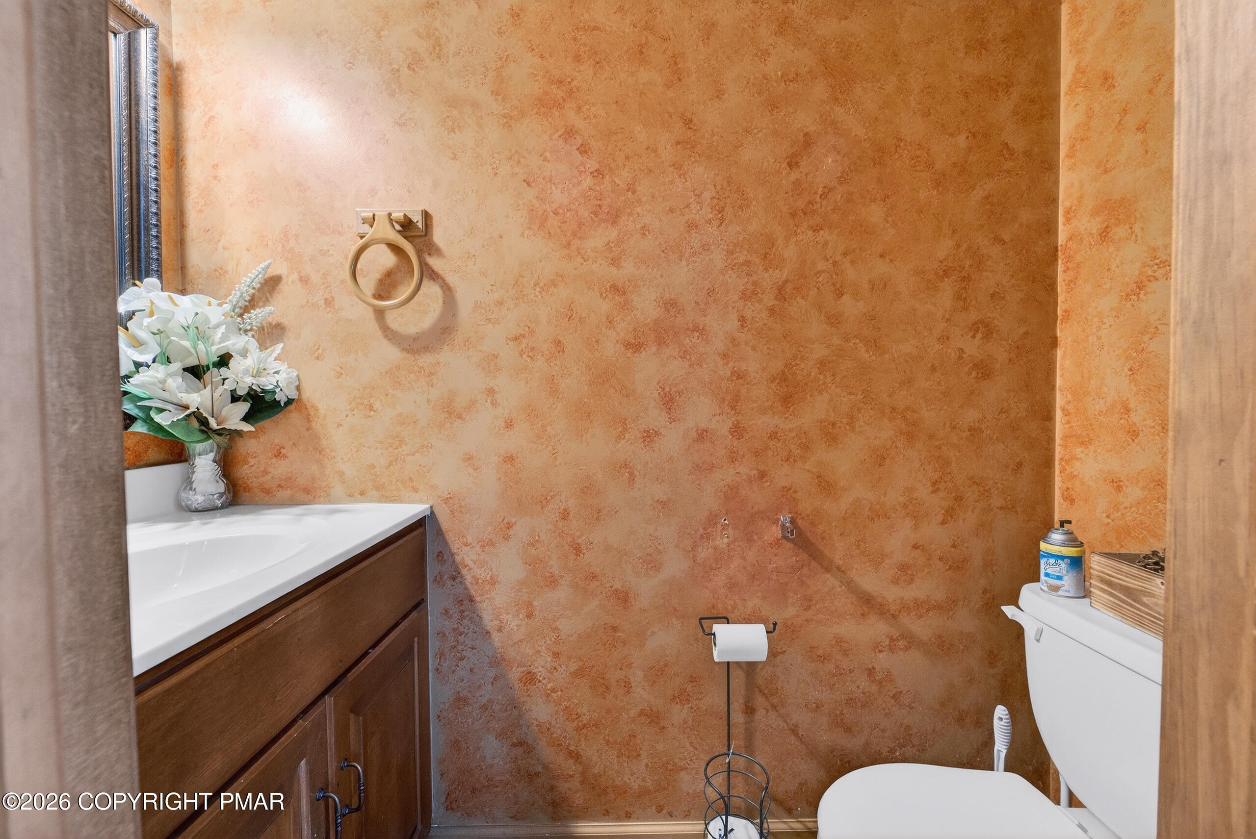 6293 Decker Road Bushkill, PA 18324 - Photo 23 of 38 a bathroom with a sink mirror and toilet