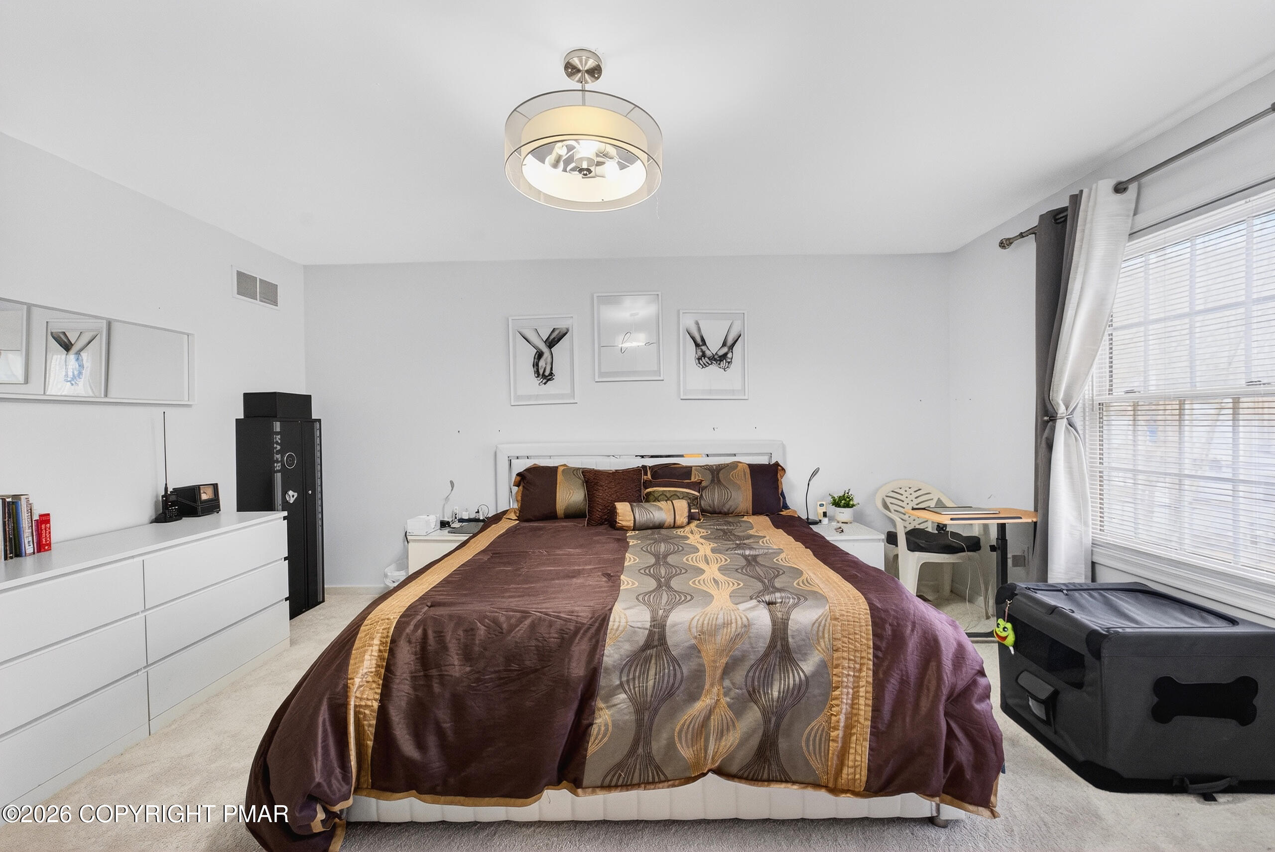6293 Decker Road Bushkill, PA 18324 - Photo 30 of 38 a bedroom with a bed and a window