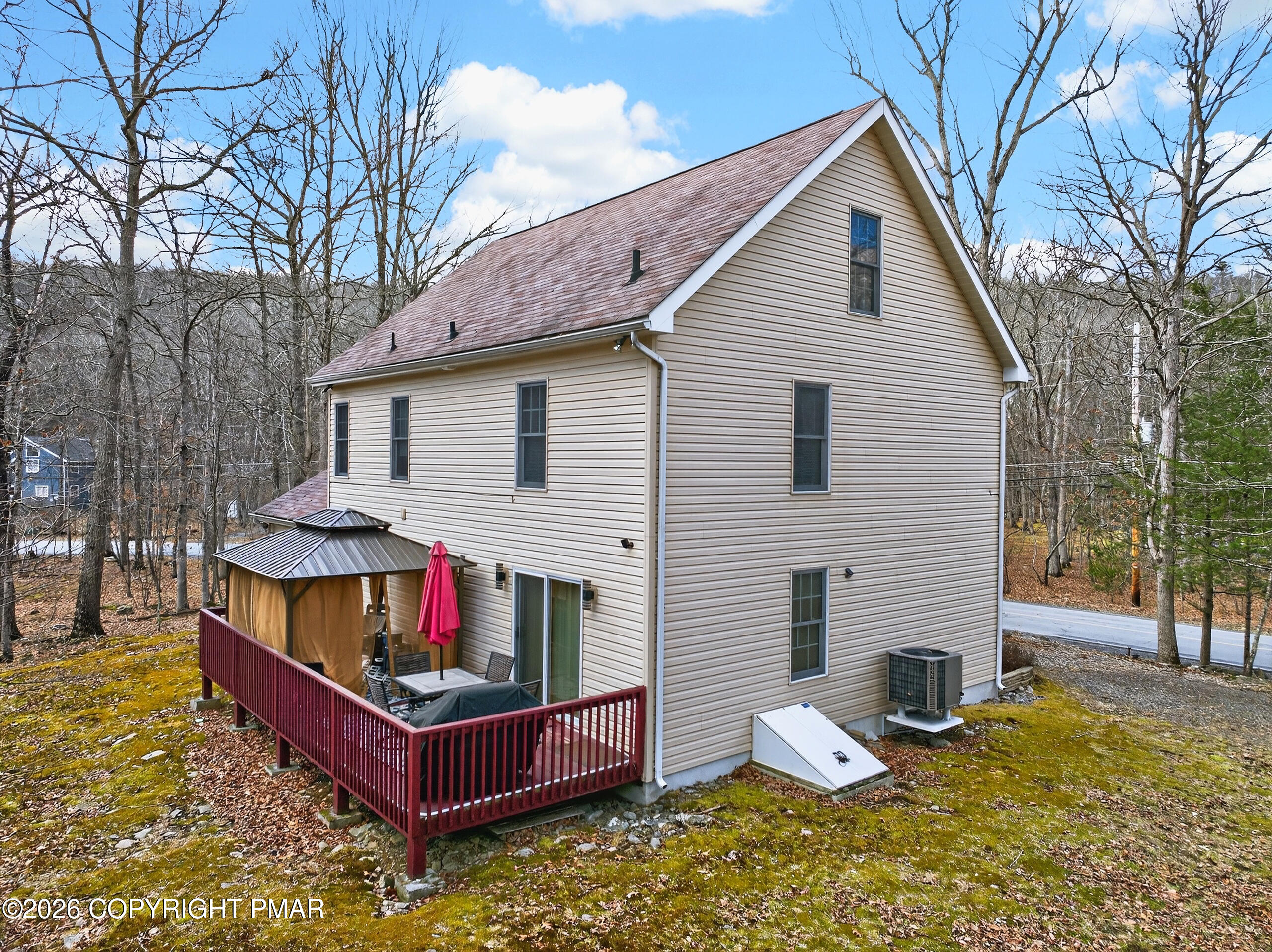 6293 Decker Road Bushkill, PA 18324 - Photo 5 of 38 a view of back yard with outdoor seating