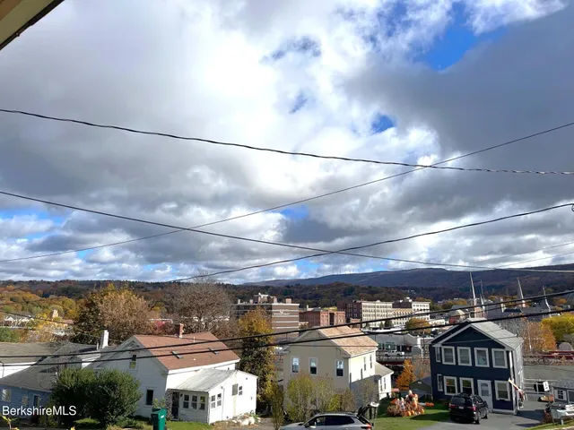a view of a city street from a building