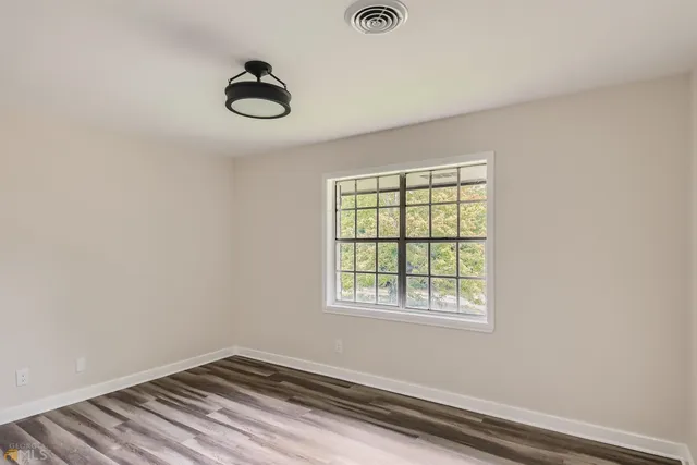 an empty room with a window