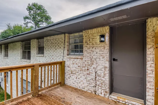 a view of a balcony with a door