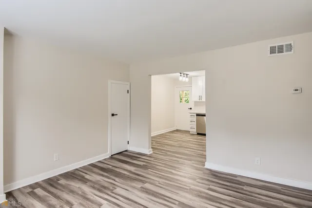 a view of an empty room and window