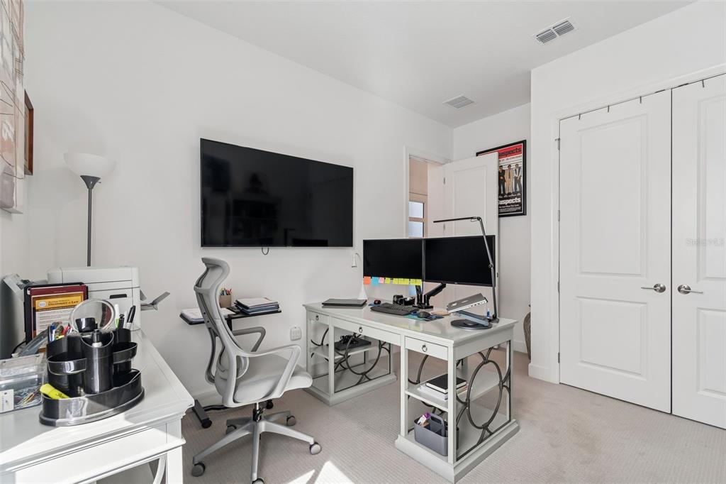 4848 Rosatti Road Wesley Chapel, FL 33543 - Photo 13 of 90 a view of a workspace with furniture