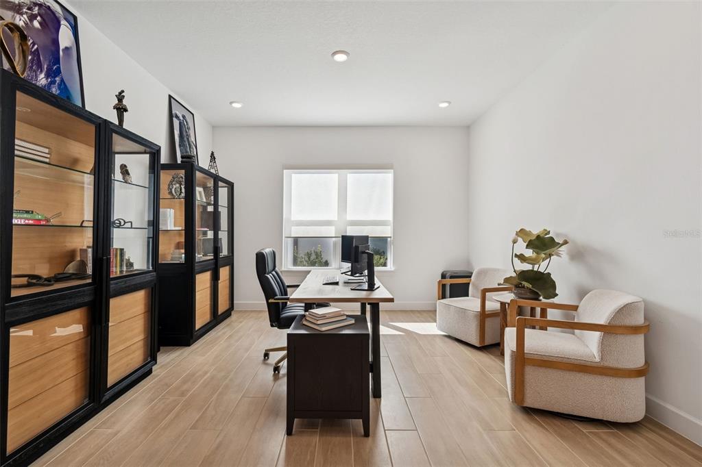 4848 Rosatti Road Wesley Chapel, FL 33543 - Photo 21 of 90 a living room with furniture wooden floor and a window