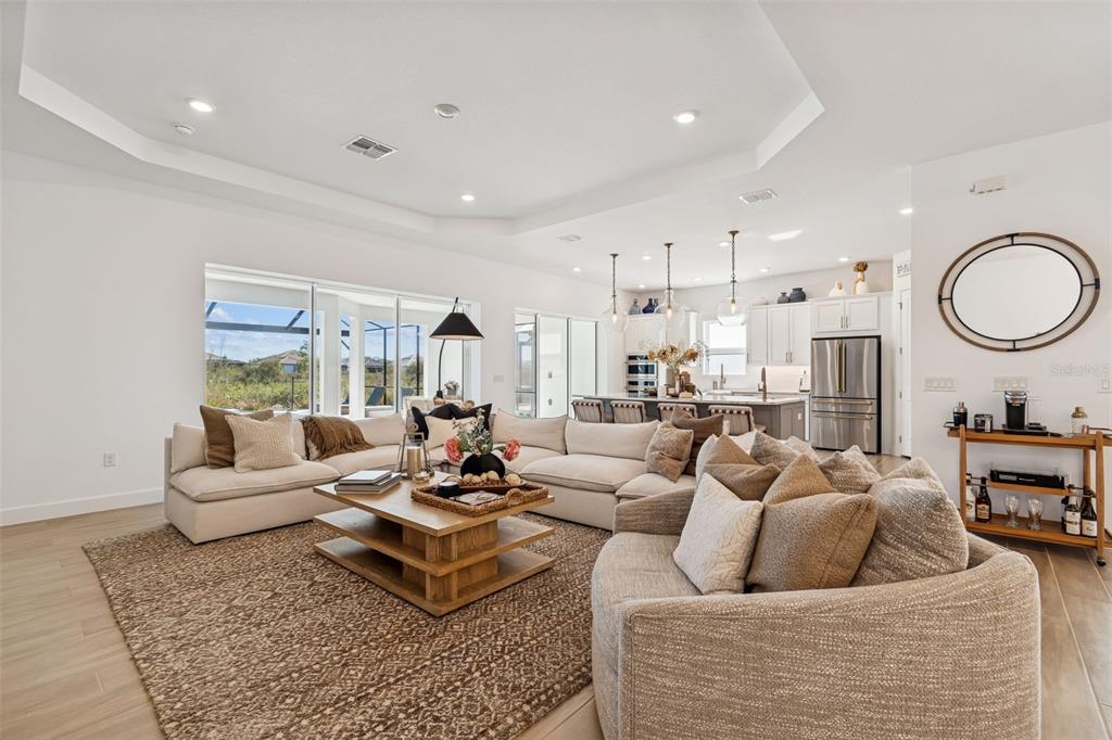 4848 Rosatti Road Wesley Chapel, FL 33543 - Photo 39 of 90 a living room with furniture and a large window