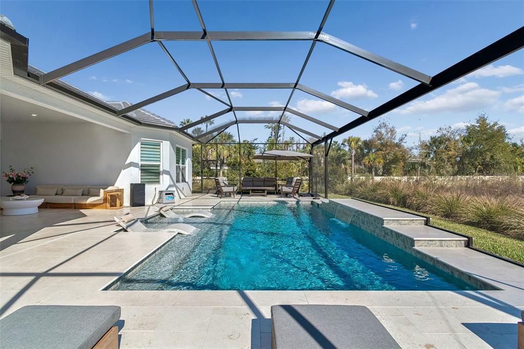 4848 Rosatti Road Wesley Chapel, FL 33543 - Photo 61 of 90 a view of swimming pool with seating area