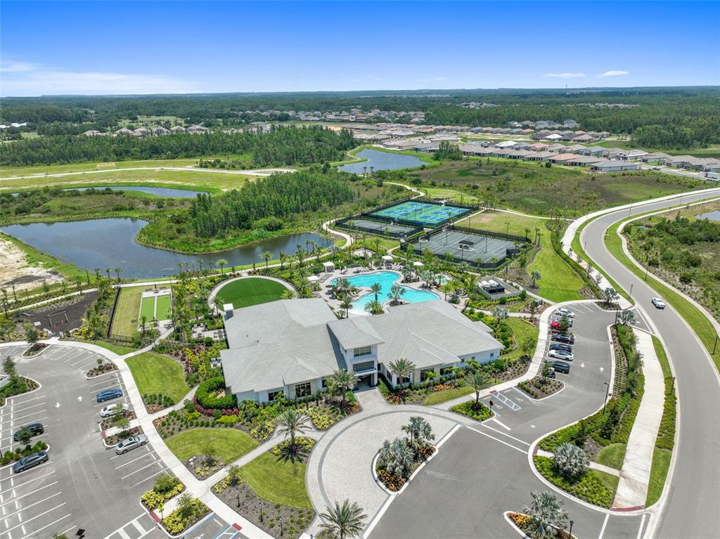 4848 Rosatti Road Wesley Chapel, FL 33543 - Photo 70 of 90 an aerial view of a house with a ocean view
