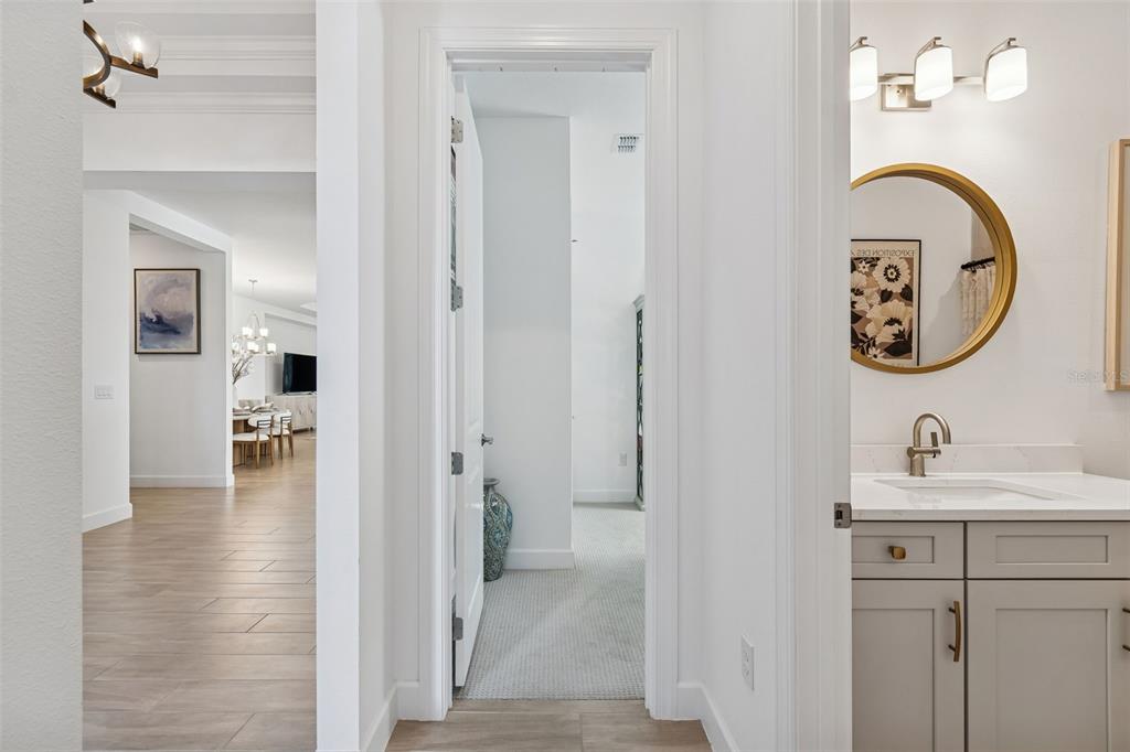 4848 Rosatti Road Wesley Chapel, FL 33543 - Photo 7 of 90 a bathroom with a sink and a mirror