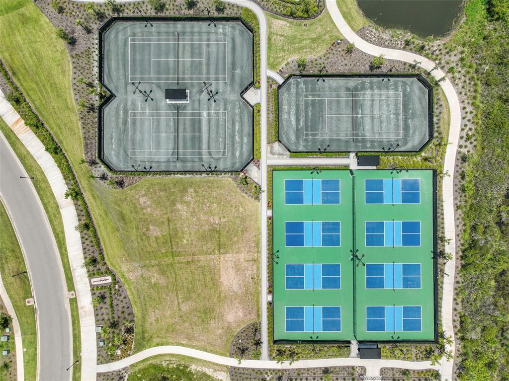 4848 Rosatti Road Wesley Chapel, FL 33543 - Photo 78 of 90 a front view of a house with a glass door