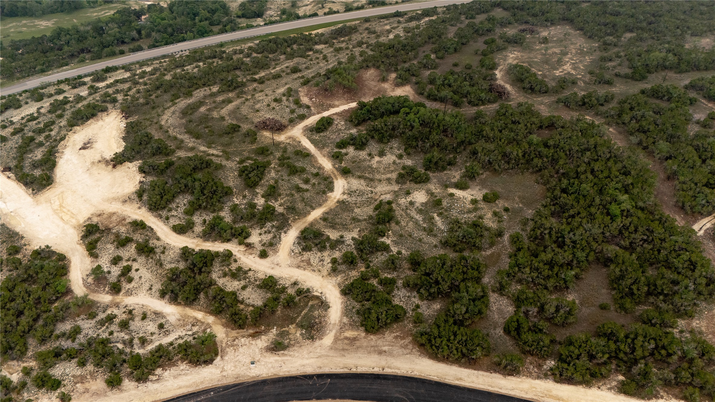 Lot 4 Ranch Road 165 Dripping Springs, TX 78620 - Photo 3 of 13 a view of a yard