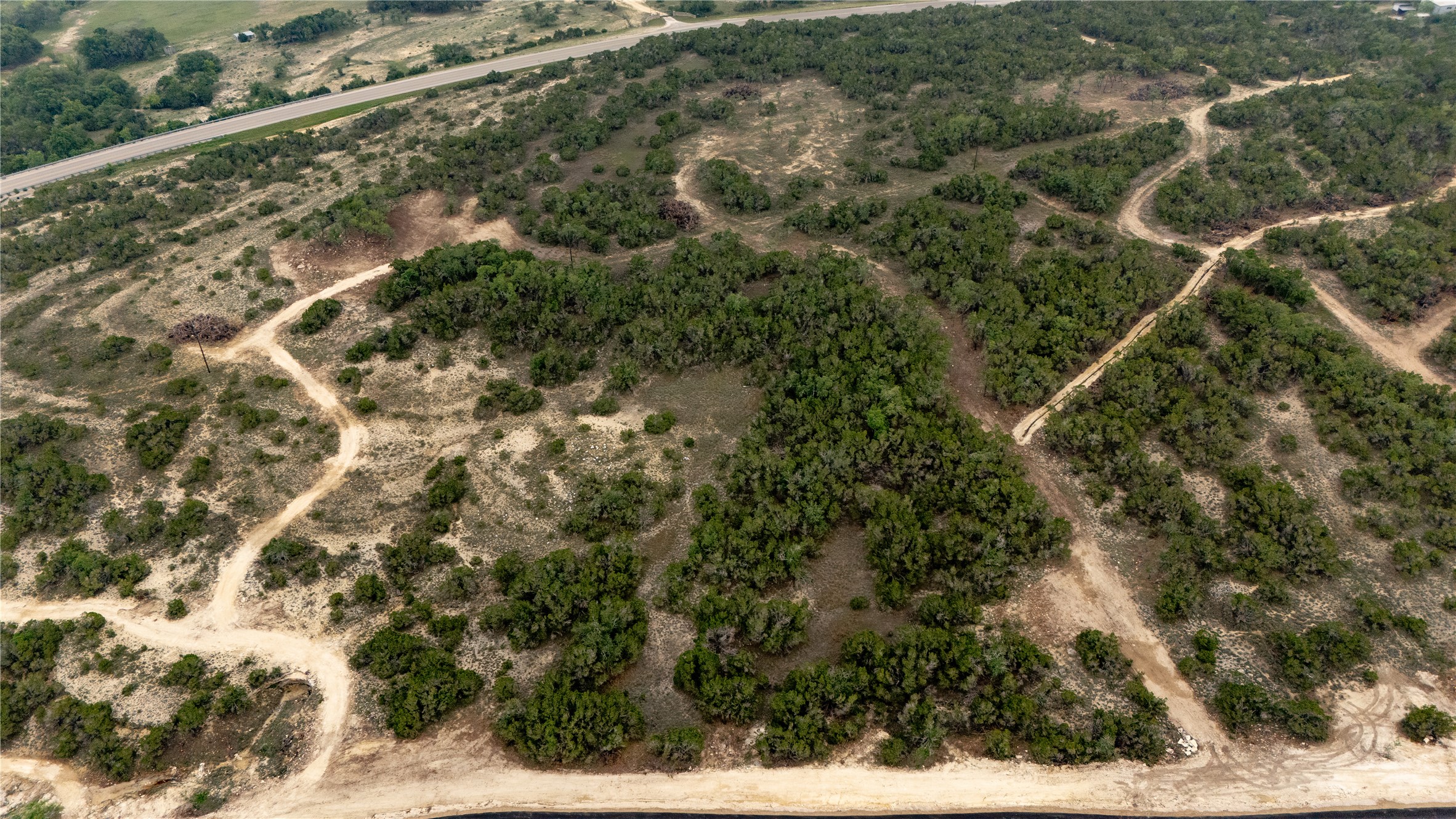 Lot 4 Ranch Road 165 Dripping Springs, TX 78620 - Photo 4 of 13 a view of a city