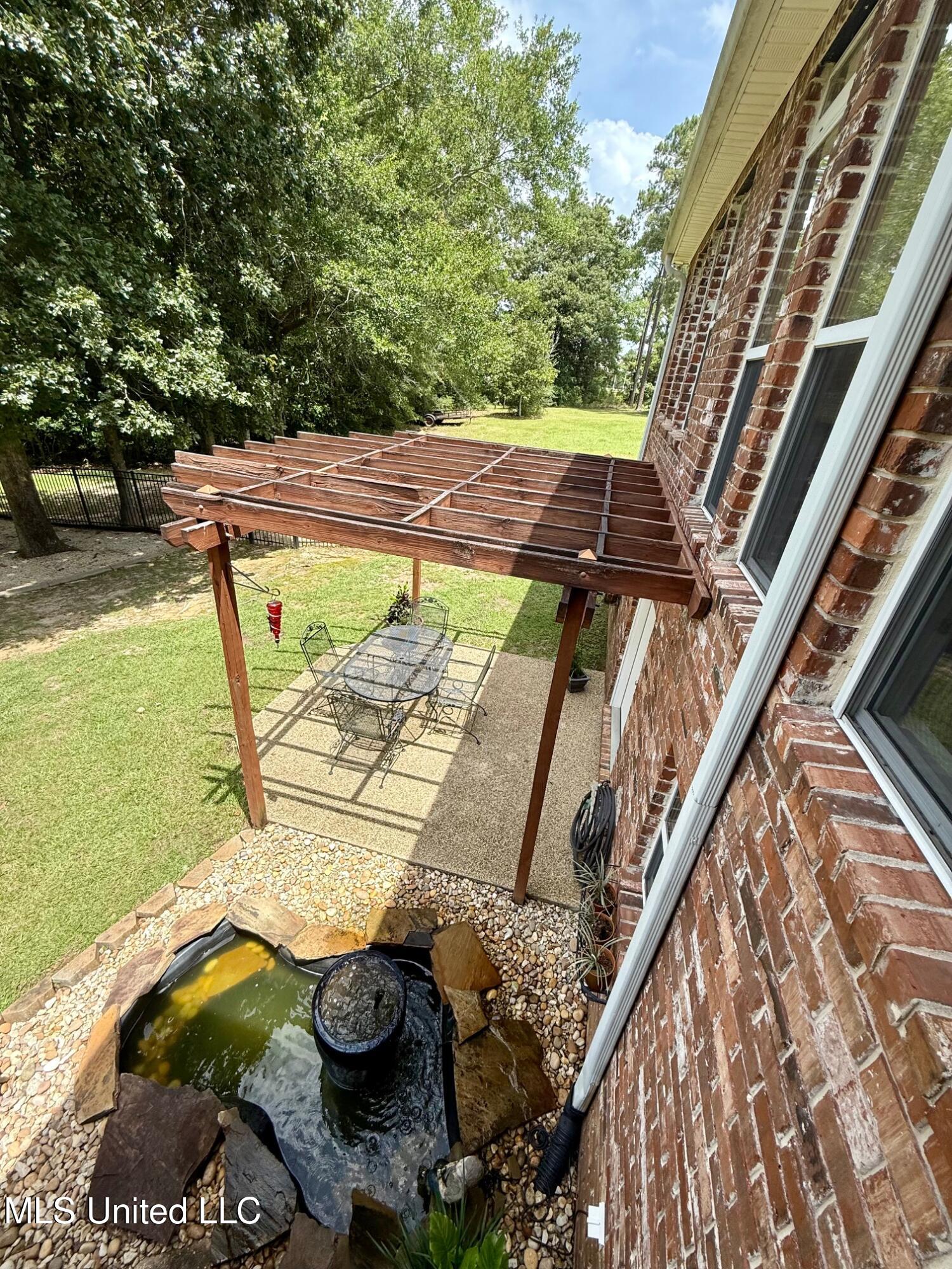 8289 Ridgewood Road Kiln, MS 39556 - Photo 55 of 66 Pergala over Workshop/Storage Room Door
