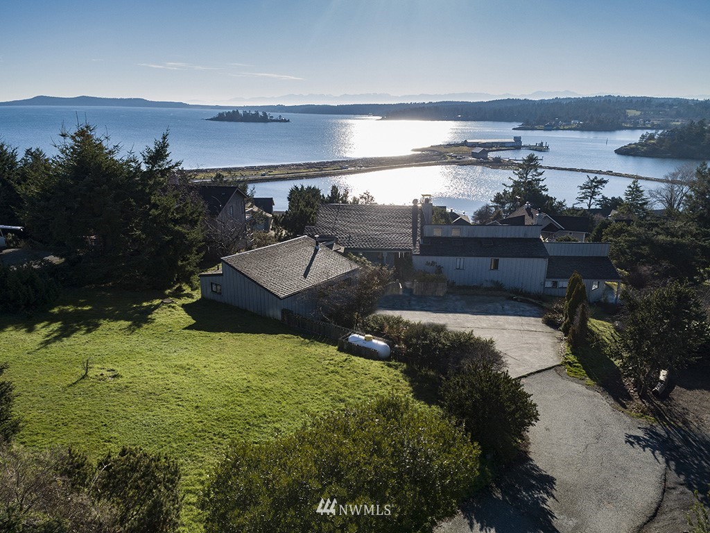 164 Pelican Way Friday Harbor, WA 98250 - Photo 2 of 13 a view of a backyard
