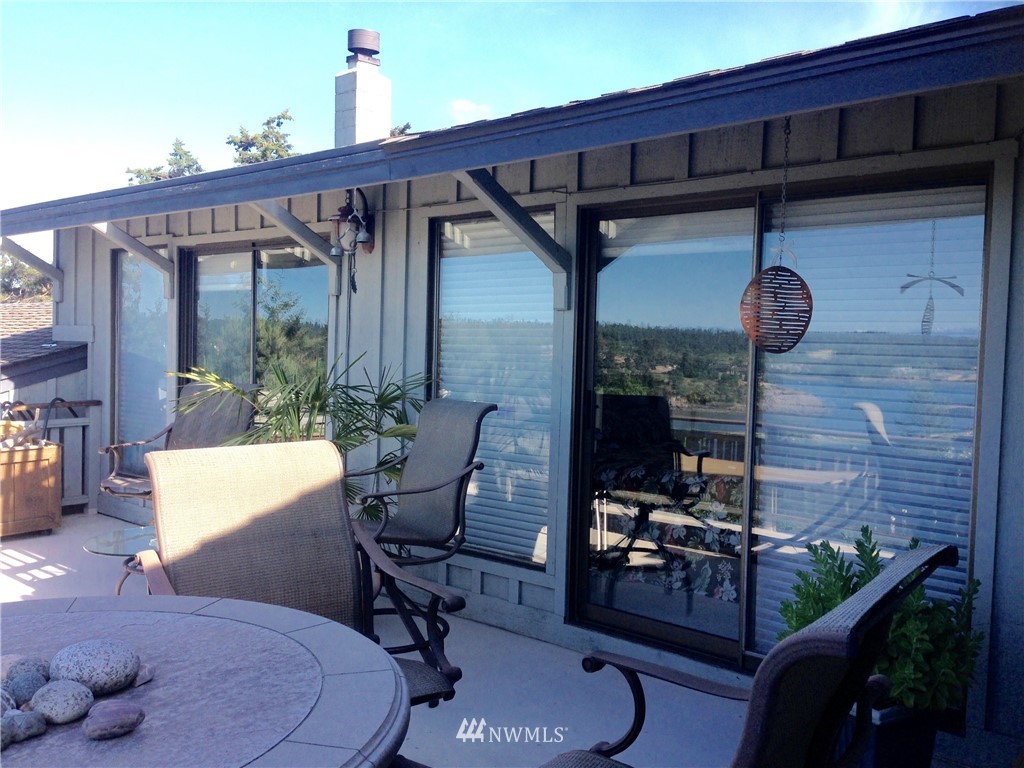 164 Pelican Way Friday Harbor, WA 98250 - Photo 12 of 13 a front view of a house with patio