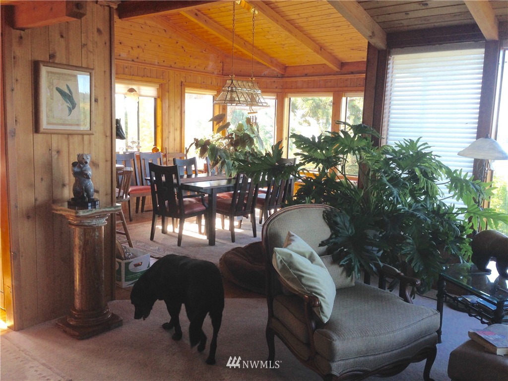 164 Pelican Way Friday Harbor, WA 98250 - Photo 9 of 13 a living room with furniture and a potted plant
