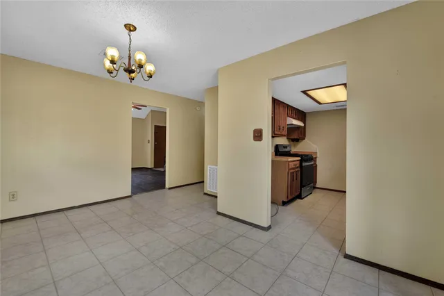 a view of a kitchen with a sink