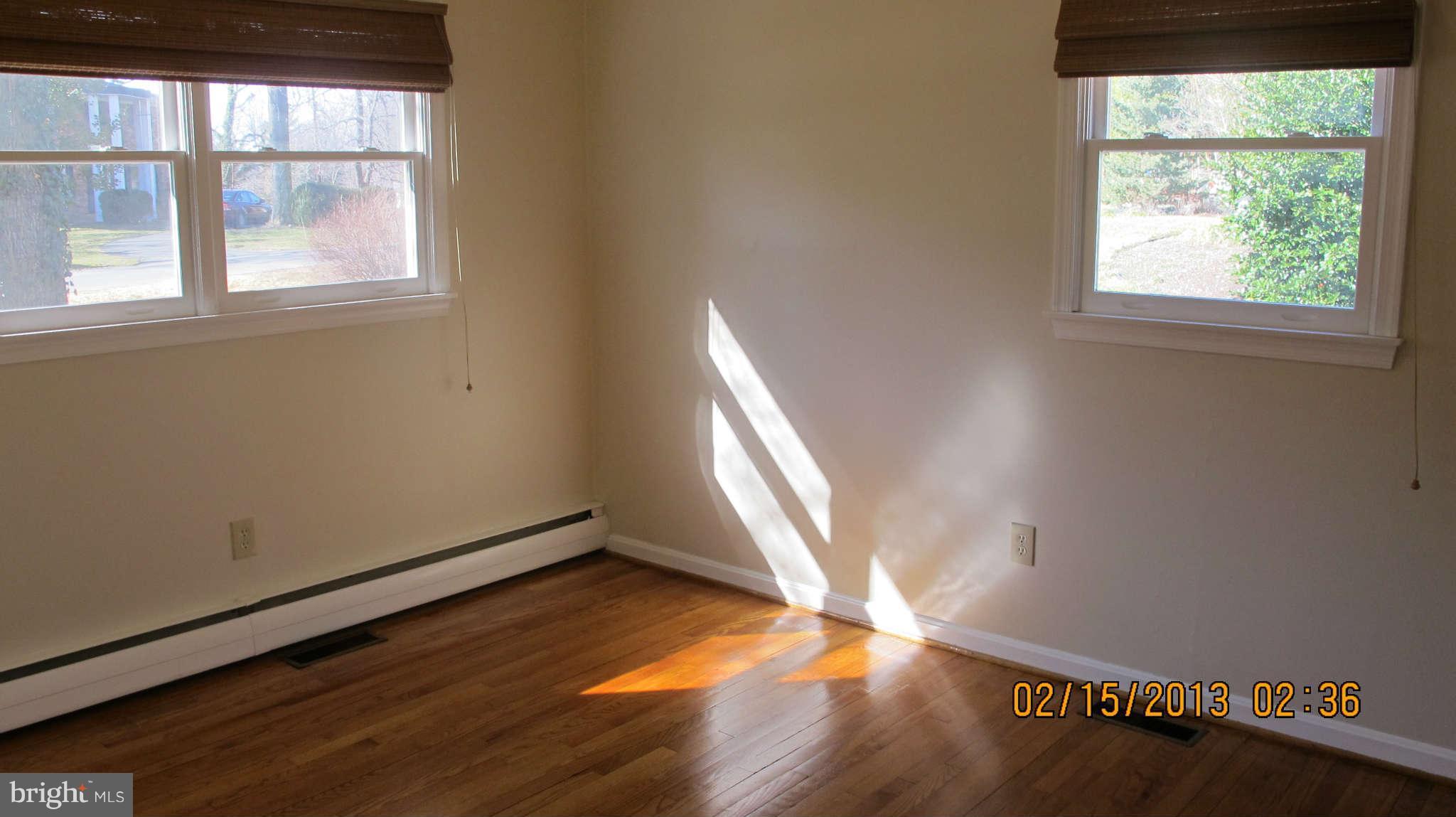 8221 Higham Road Lorton, VA 22079 - Photo 11 of 30 First Bedroom with hardwoods