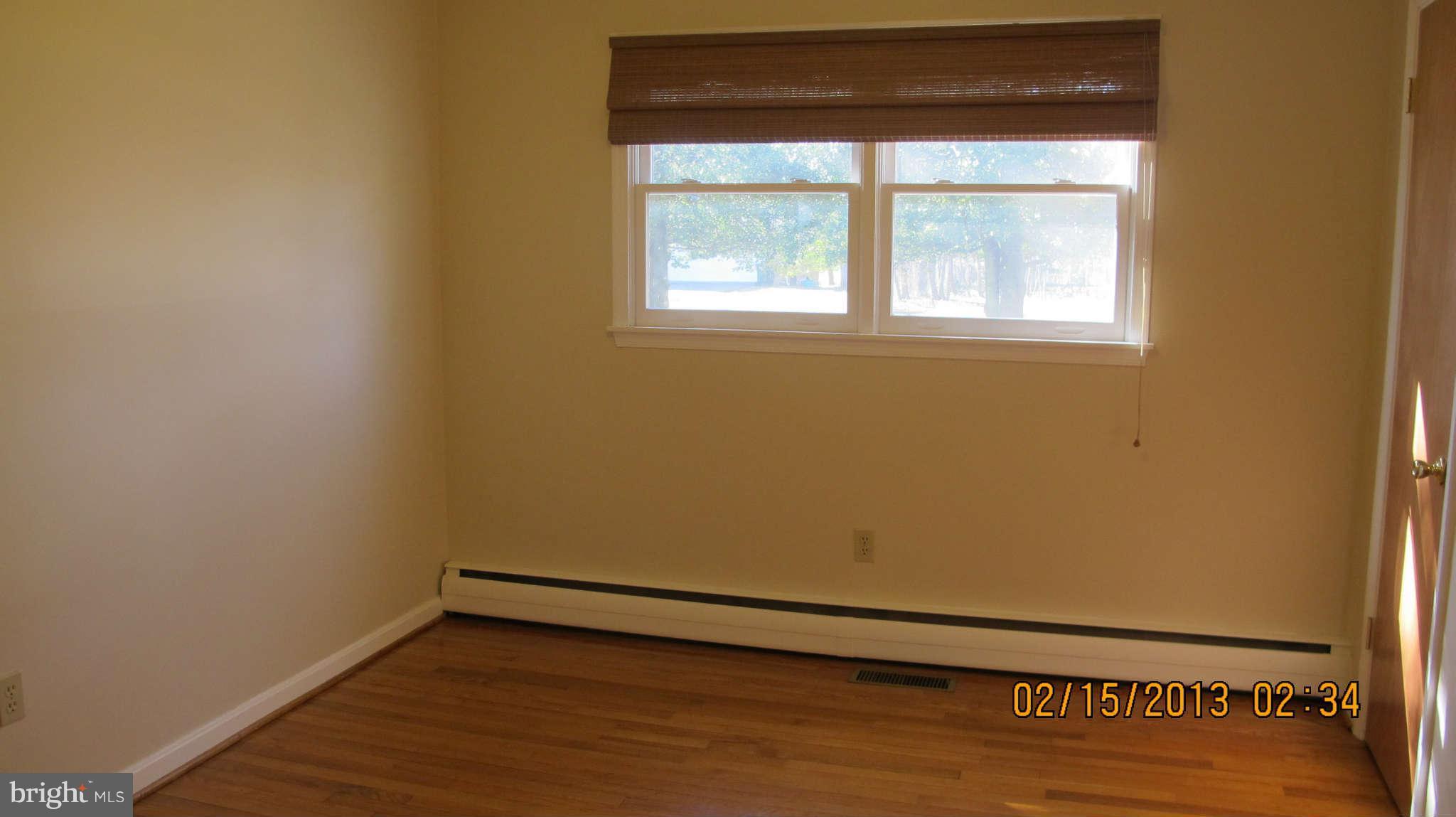 8221 Higham Road Lorton, VA 22079 - Photo 13 of 30 First Bedroom with celling fan