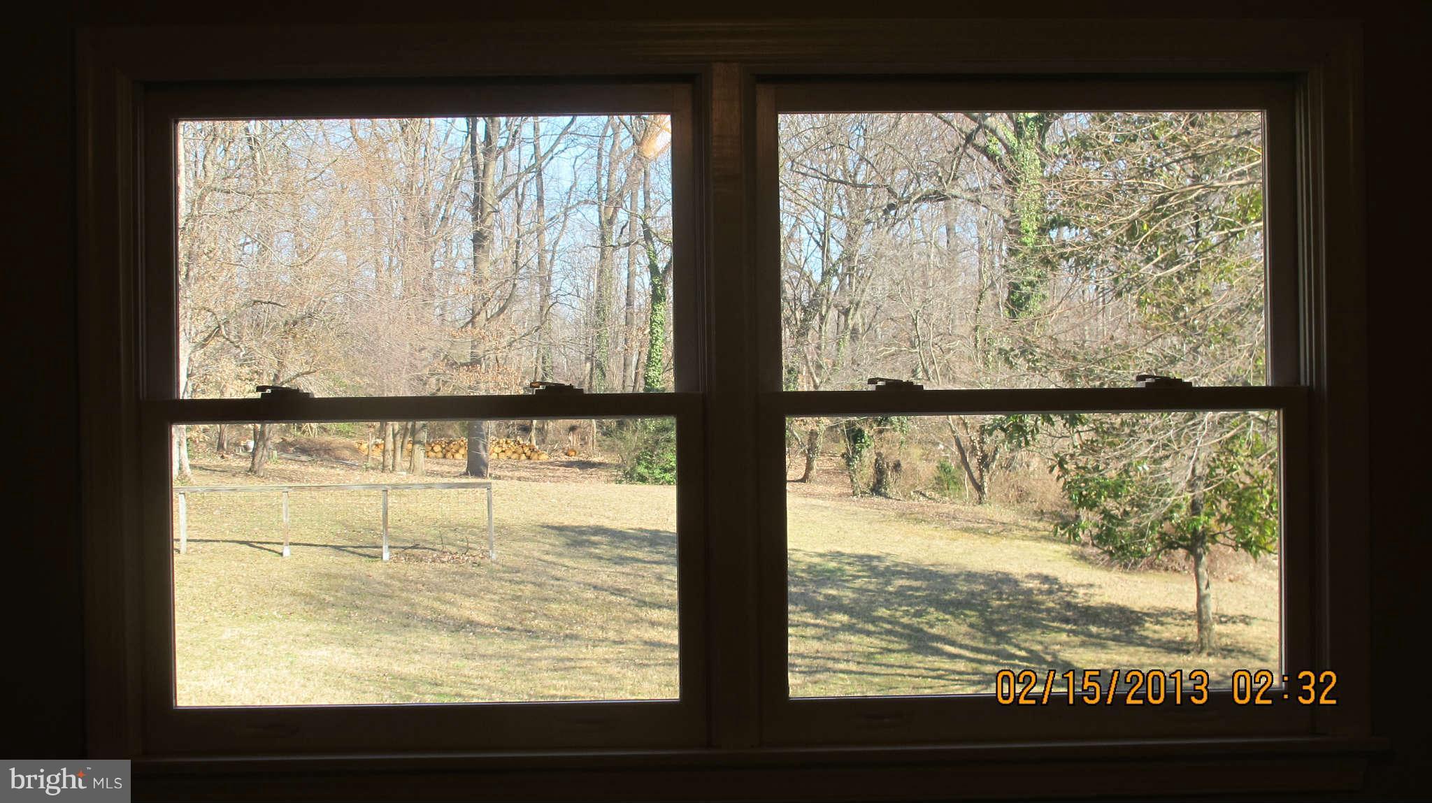 8221 Higham Road Lorton, VA 22079 - Photo 9 of 30 Kitchen with scenic view to backyard