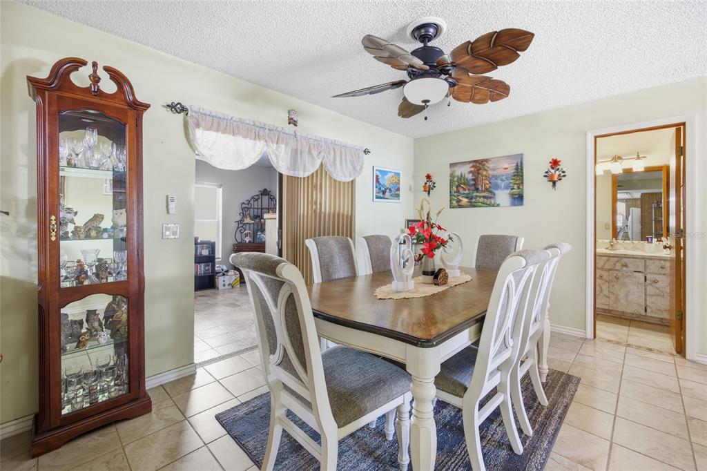 5141 East Backner Lane Inverness, FL 34452 - Photo 18 of 31 a dining room with furniture and window