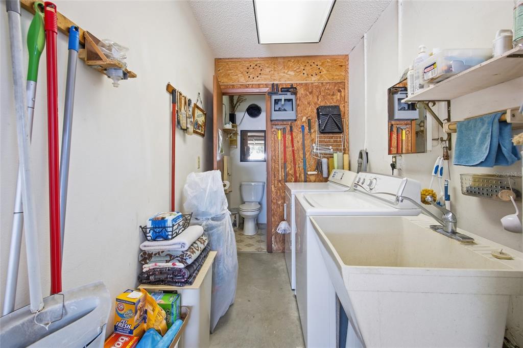 5141 East Backner Lane Inverness, FL 34452 - Photo 31 of 31 a bathroom with a sink and a mirror