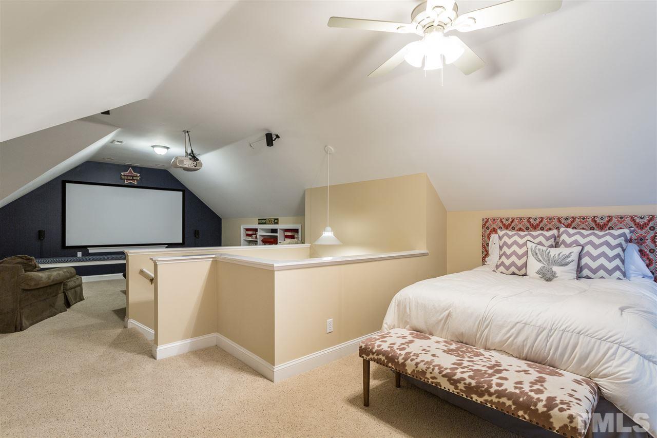 9100 Brompton Court Raleigh, NC 27615 - Photo 26 of 30 3rd Floor Loft Bedroom with walk-in closet and full bath
