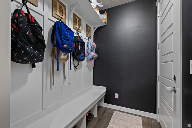 1074 South 750 West Springville, UT 84663 - Photo 22 of 28 Built-in storage bench with board and batten wall treatment, integrated hooks, and overhead shelving