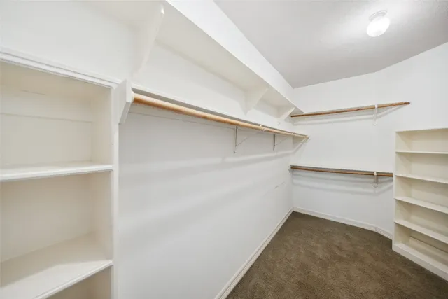 a view of an empty walk in closet