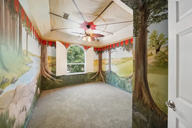 a view of a porch with furniture and a yard