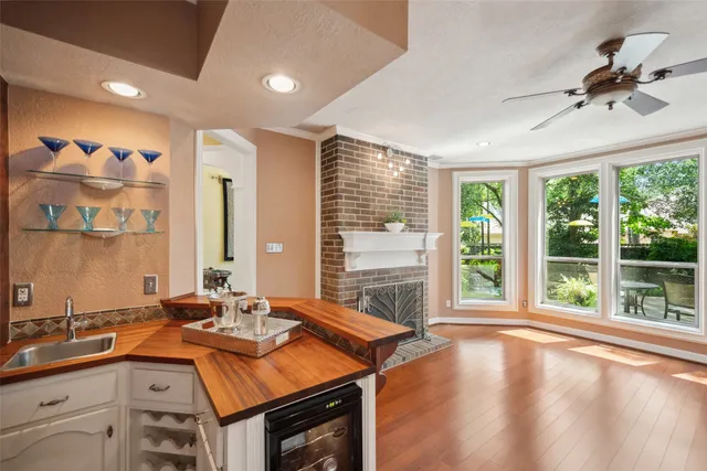 a view of a kitchen with a sink and a window