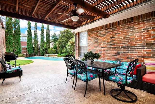 a view of yard with patio