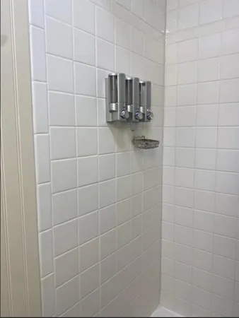 a bathroom with a close view of a shower