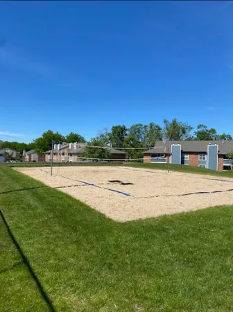 a view of a lake with a yard
